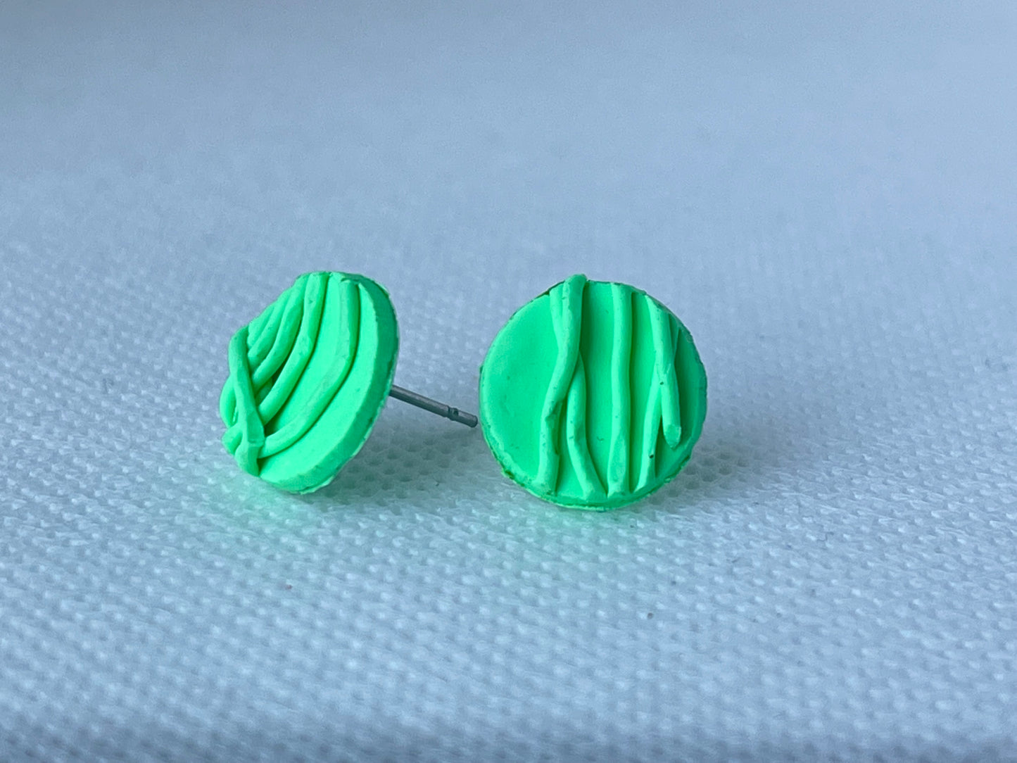 Loose end stud earrings
